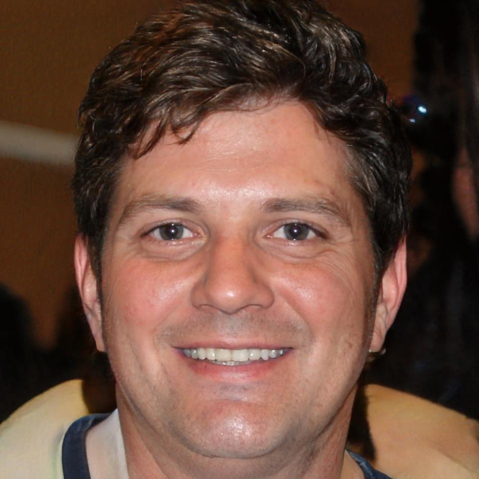 Professional headshot of Kieran Vestergaard